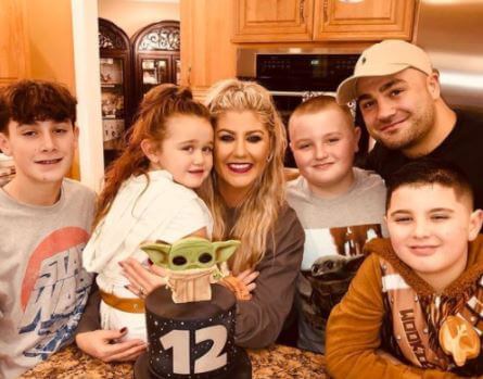 Jamie Alvarez with her husband Eddie Alvarez and children.